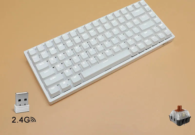 White 84-key mechanical keyboard with white backlighting and red switches on a desk