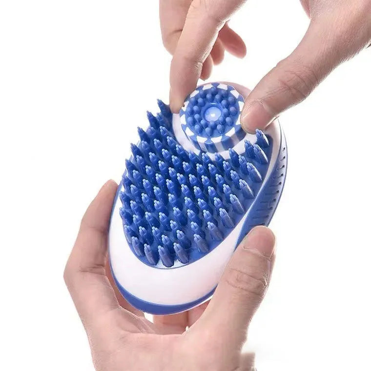 Silicone pet bath brush in blue with liquid storage compartment for cats and dogs