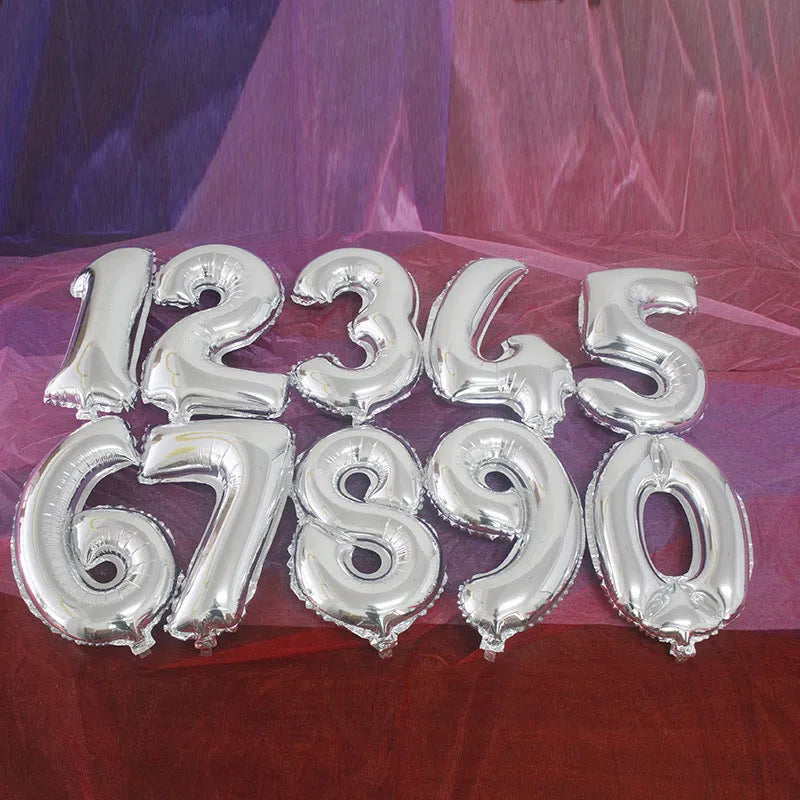 Set of five metallic aluminium film letter balloons in Blue, Gold, Pink, Rose Gold, and Silver, isolated on white background