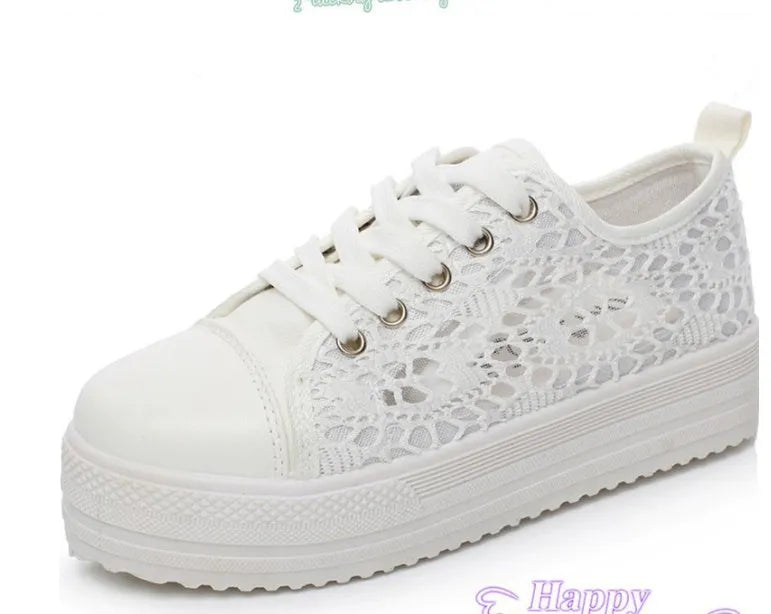White canvas shoes for women with rubber sole and plain pattern, sizes 35 to 43