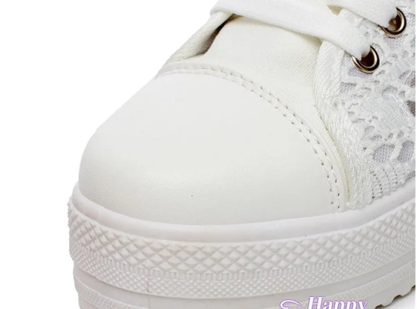 White canvas shoes for women with rubber sole and plain pattern, sizes 35 to 43