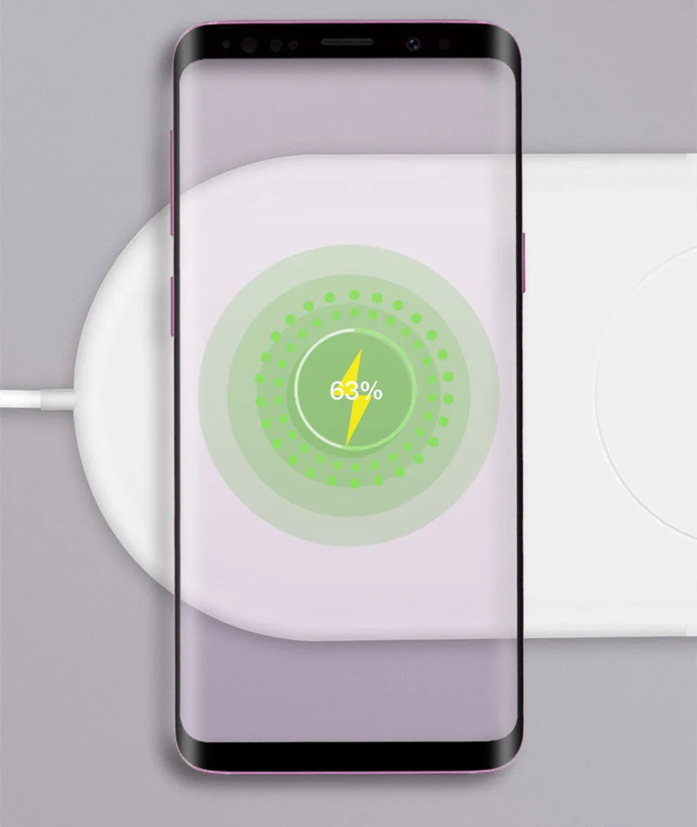 White dual wireless charging pad for two mobile phones on simple design