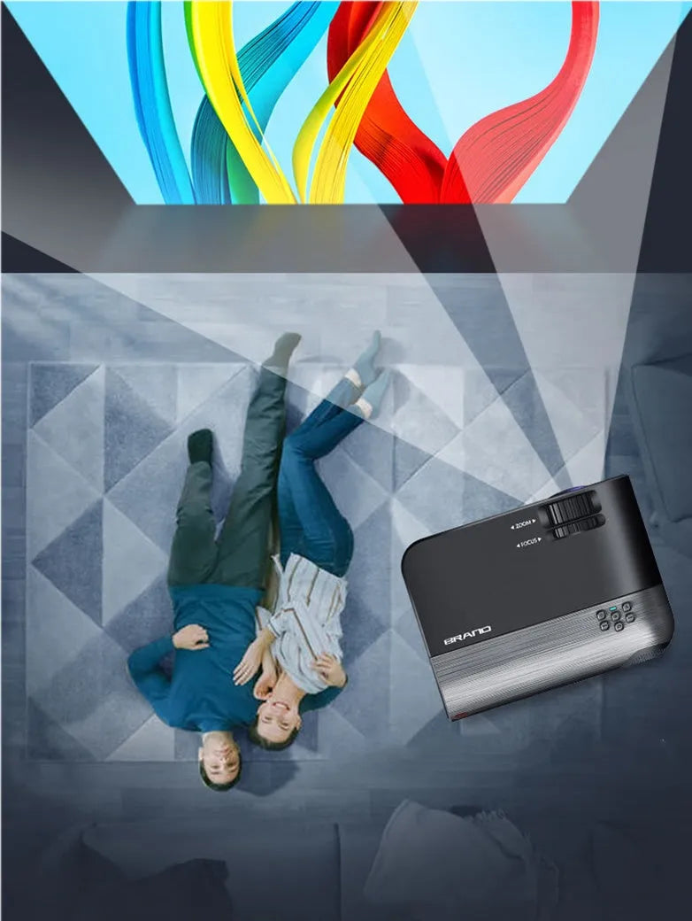 Portable white Android Wi-Fi projector with lens and ventilation grilles on a wooden surface.
