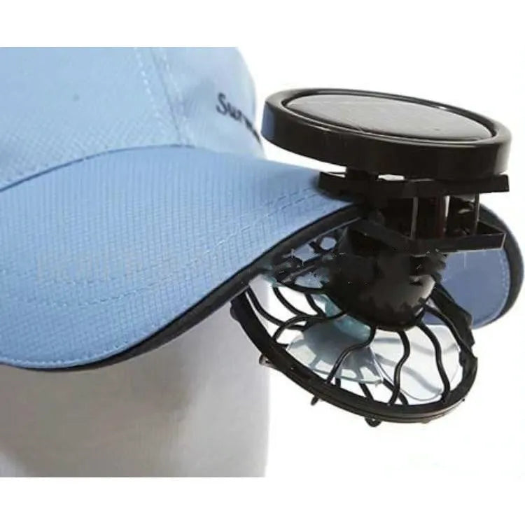 Black portable solar-powered clip fan with solar panel for outdoor cooling.