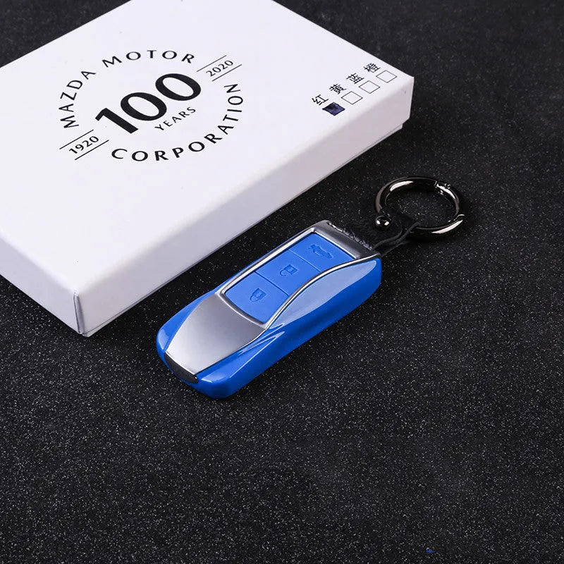 Silicone car key cover in red with creative car-styling design on a keychain