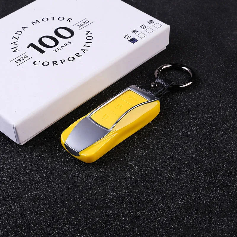 Silicone car key cover in red with creative car-styling design on a keychain