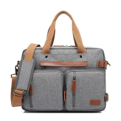 Convertible laptop backpack 15.6 inch in black with waterproof nylon exterior and tote mode