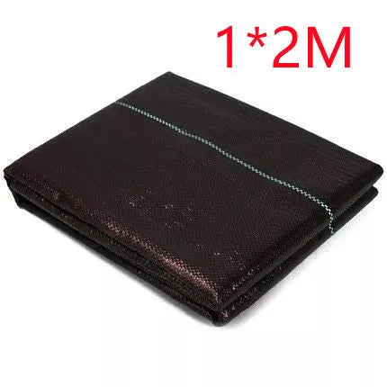 Black PE plastic weed control cloth laid flat with measuring tape showing dimensions for greenhouse and farmland use