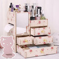 Wooden cosmetic storage box with drawer compartments and cartoon pattern design