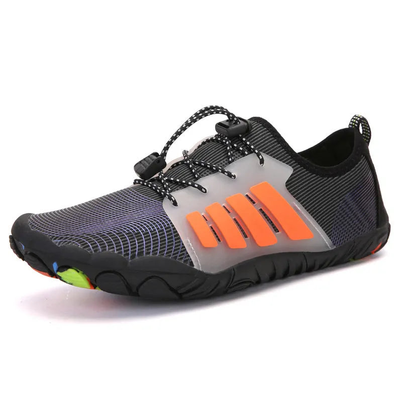 Couple outdoor sports diving beach shoes with mesh upper and non-slip rubber outsole, shown on surface