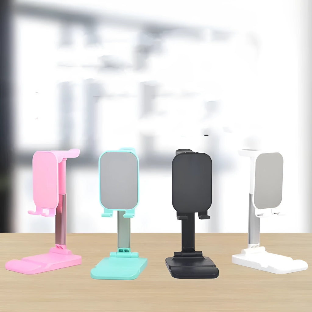 Folding mobile phone stand on a desk holding a smartphone, available in black green pink and white colours