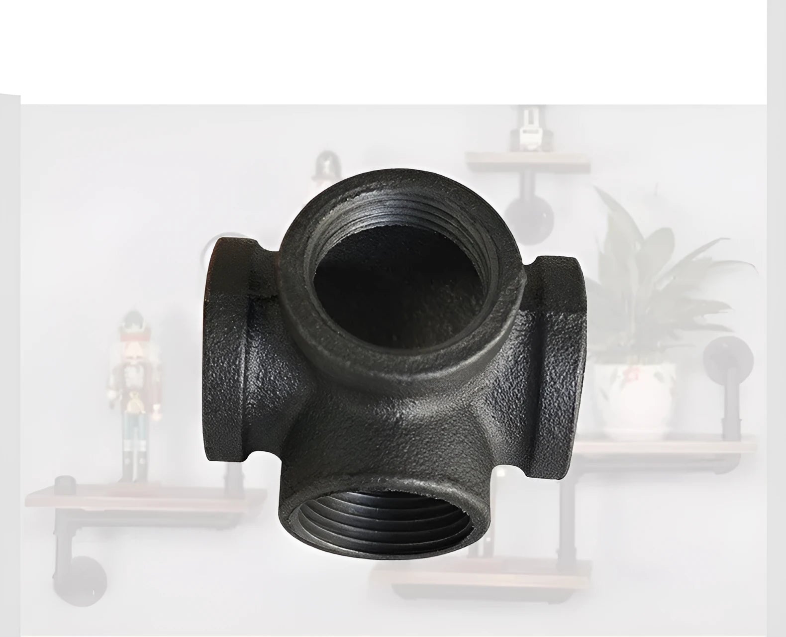 Galvanized steel four-way pipe fitting with three-dimensional corner design