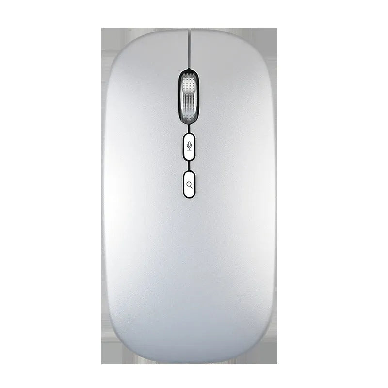 Silver intelligent voice mouse with voice typing translation and wireless charging on desk