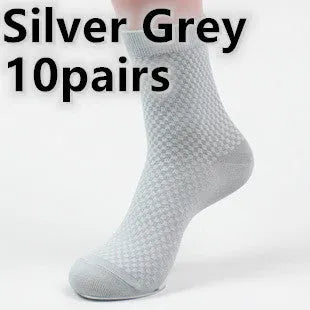 Pair of men's bamboo fibre business socks with small square pattern, shown in navy blue.