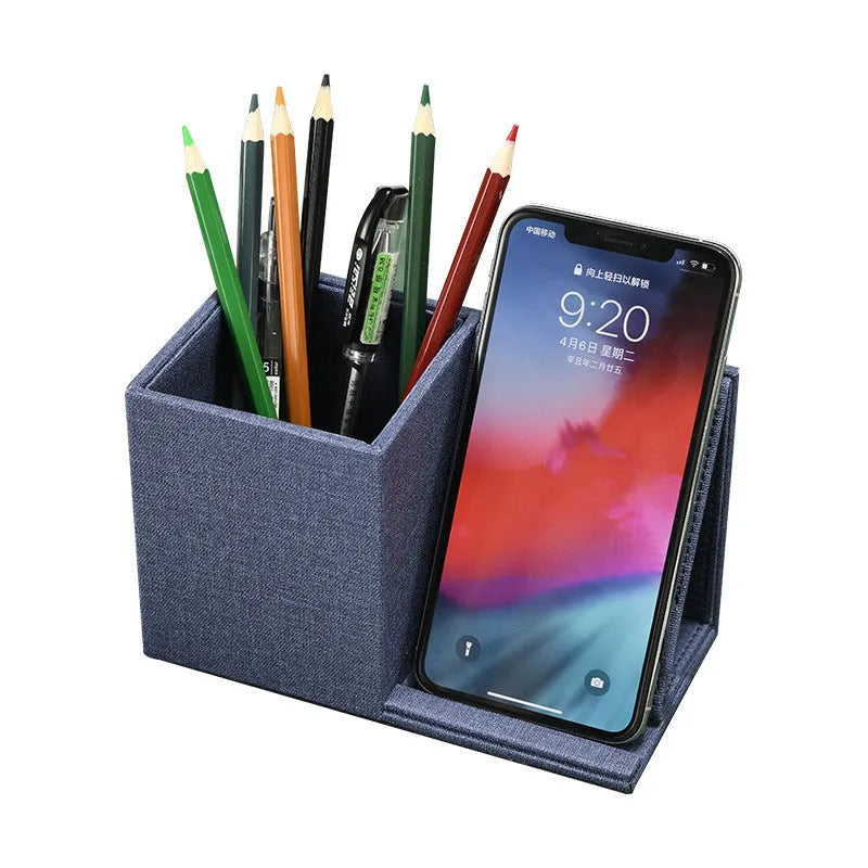 Multifunctional PU wireless charging pen holder storage box in grey with pens inside and LED indicator