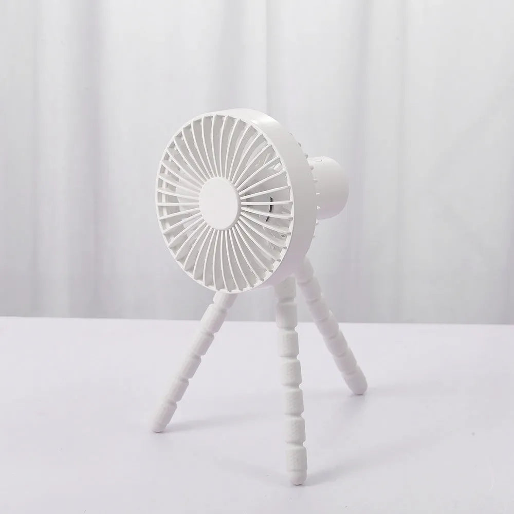 Adjustable tripod desktop fan with a bending head in black, shown in handheld and desktop positions.