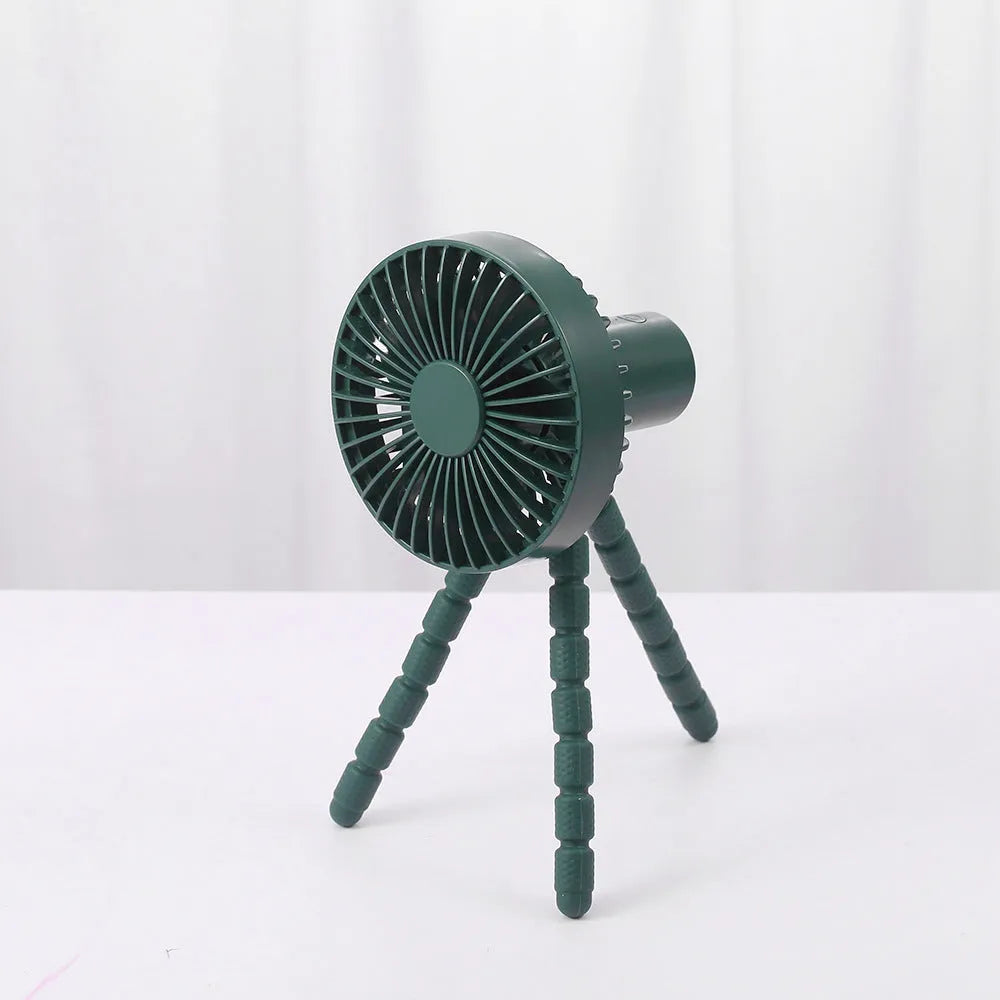 Adjustable tripod desktop fan with a bending head in black, shown in handheld and desktop positions.