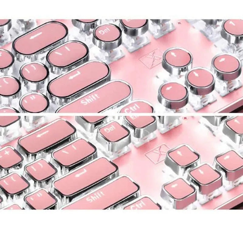 Silver and pink wired mechanical keyboard with green switches and white backlight alongside a mouse on a desk.