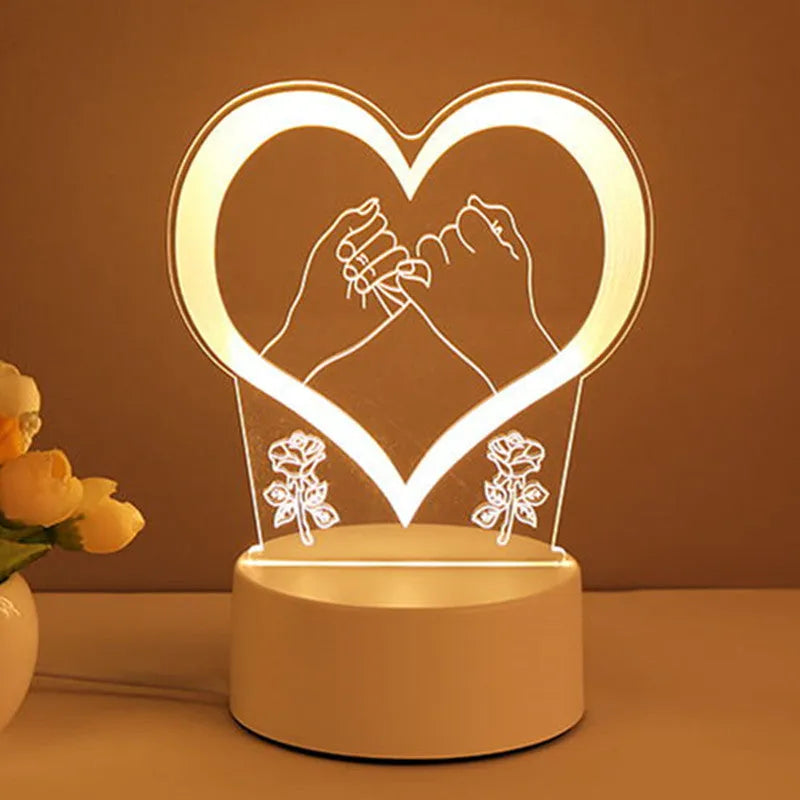 3D acrylic USB LED night light with unicorn design and warm white projection on a desk