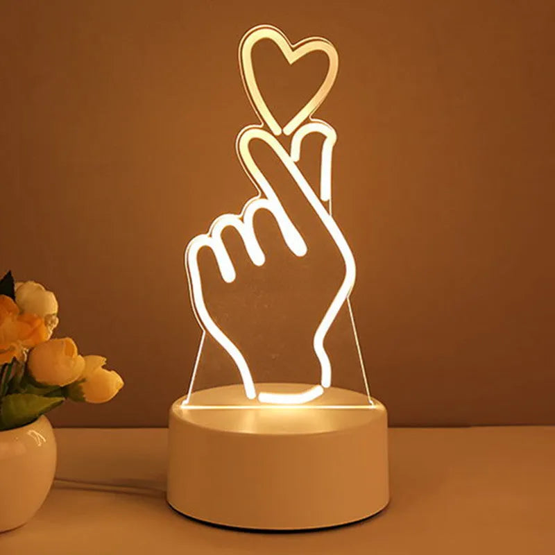 3D acrylic USB LED night light with unicorn design and warm white projection on a desk