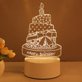 3D acrylic USB LED night light with unicorn design and warm white projection on a desk