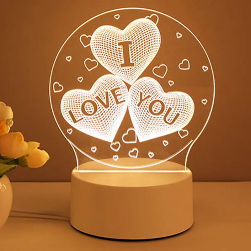 3D acrylic USB LED night light with unicorn design and warm white projection on a desk
