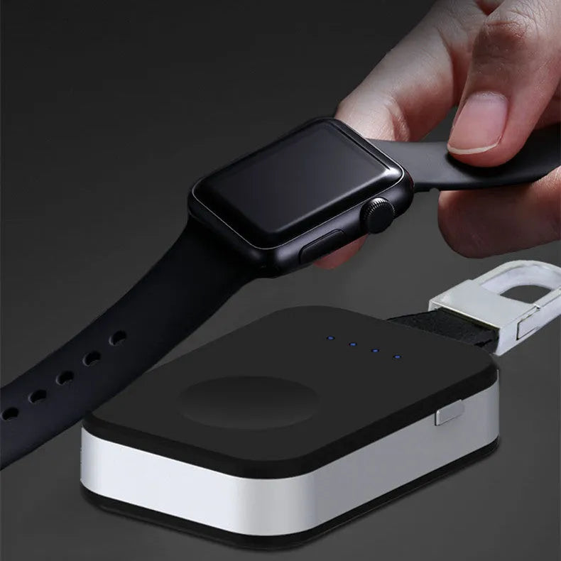 Black Apple Watch wireless power bank with keychain attachment showing compact rectangular design