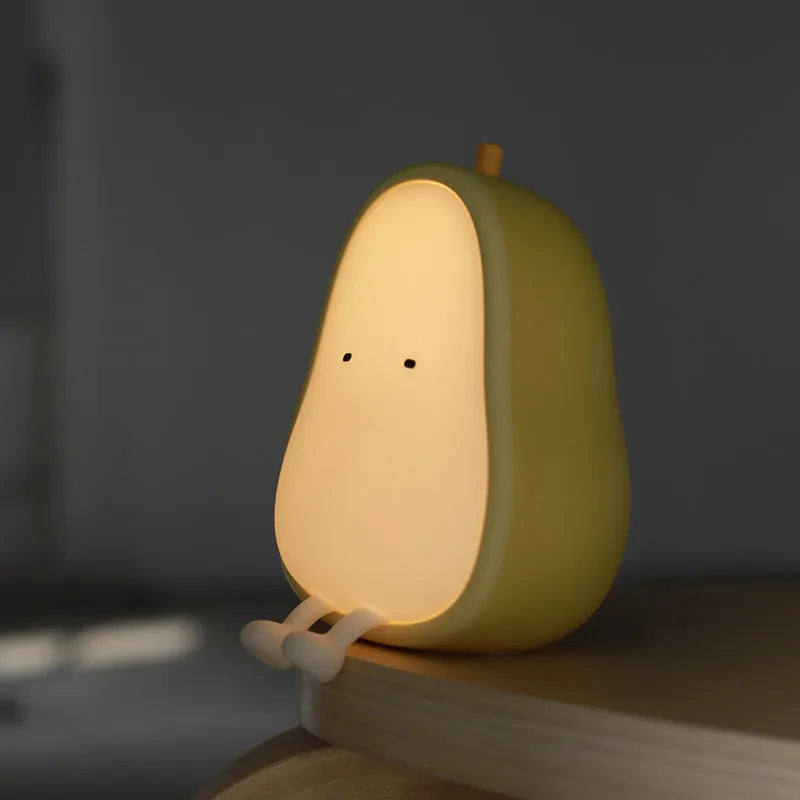 PEAR warm yellow bedside LED night lamp with ABS silicone construction showing compact design