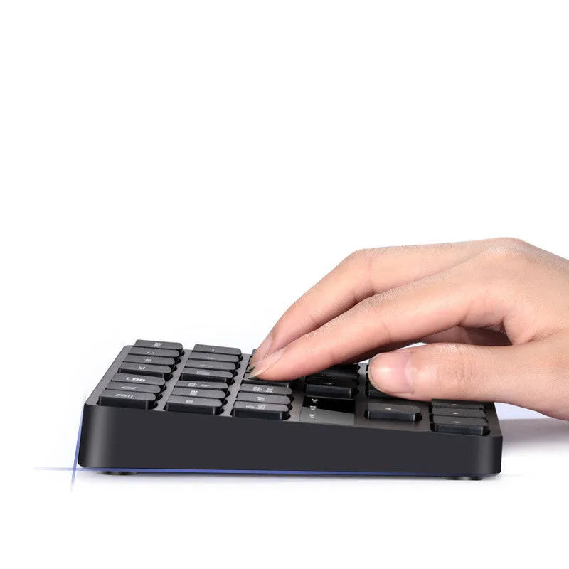 Multifunctional 35-key wireless numeric keyboard in black with USB receiver and charging cable