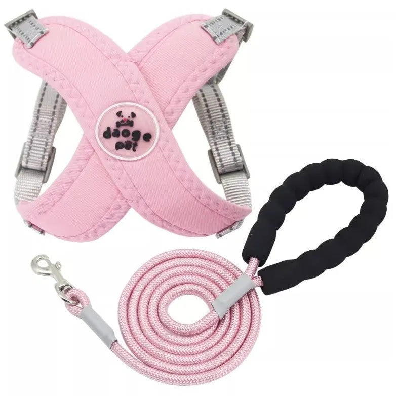 Polyester dog vest with attached hand holding rope in blue, green, pink, or yellow.