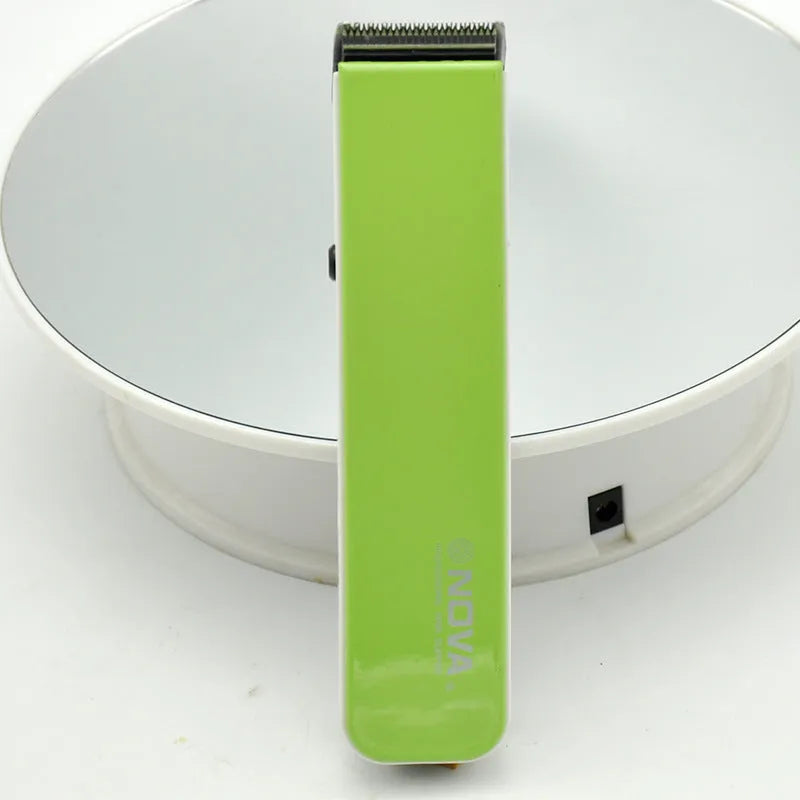 Electric hair clipper with removable blade head in black, blue, orange, red, or white colour options.
