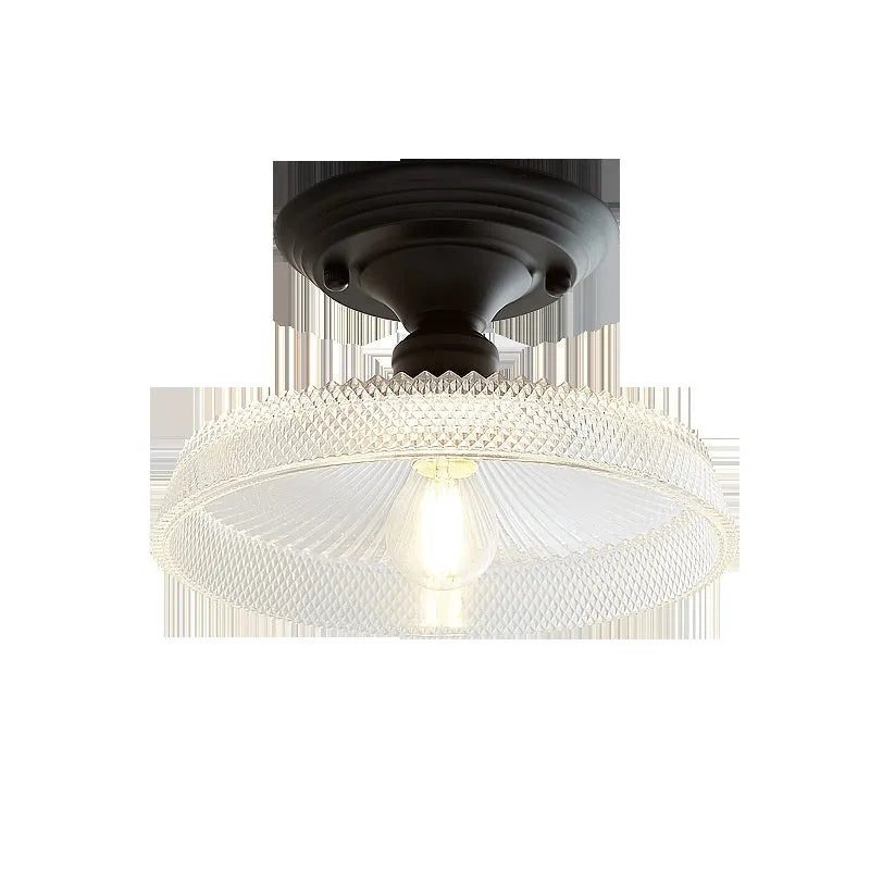 American retro style single-head ceiling or wall lamp with a glass cover.
