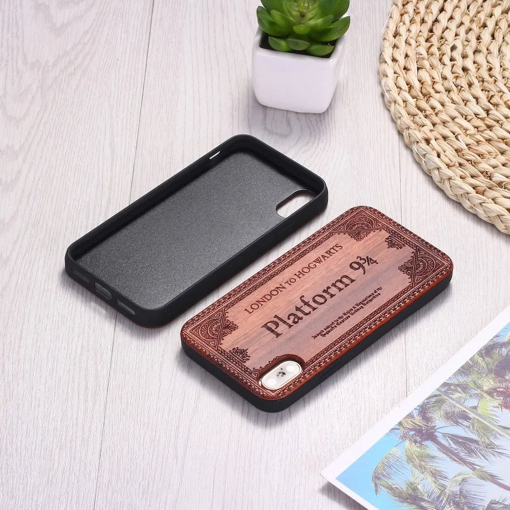 Wooden iPhone case with laser-carved cartoon animal design and TPU bumper in rosewood colour.