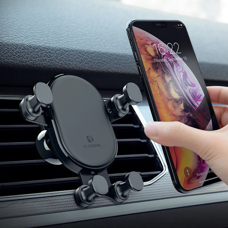 Black gravity car vent phone holder with 360-degree rotation on a car air vent