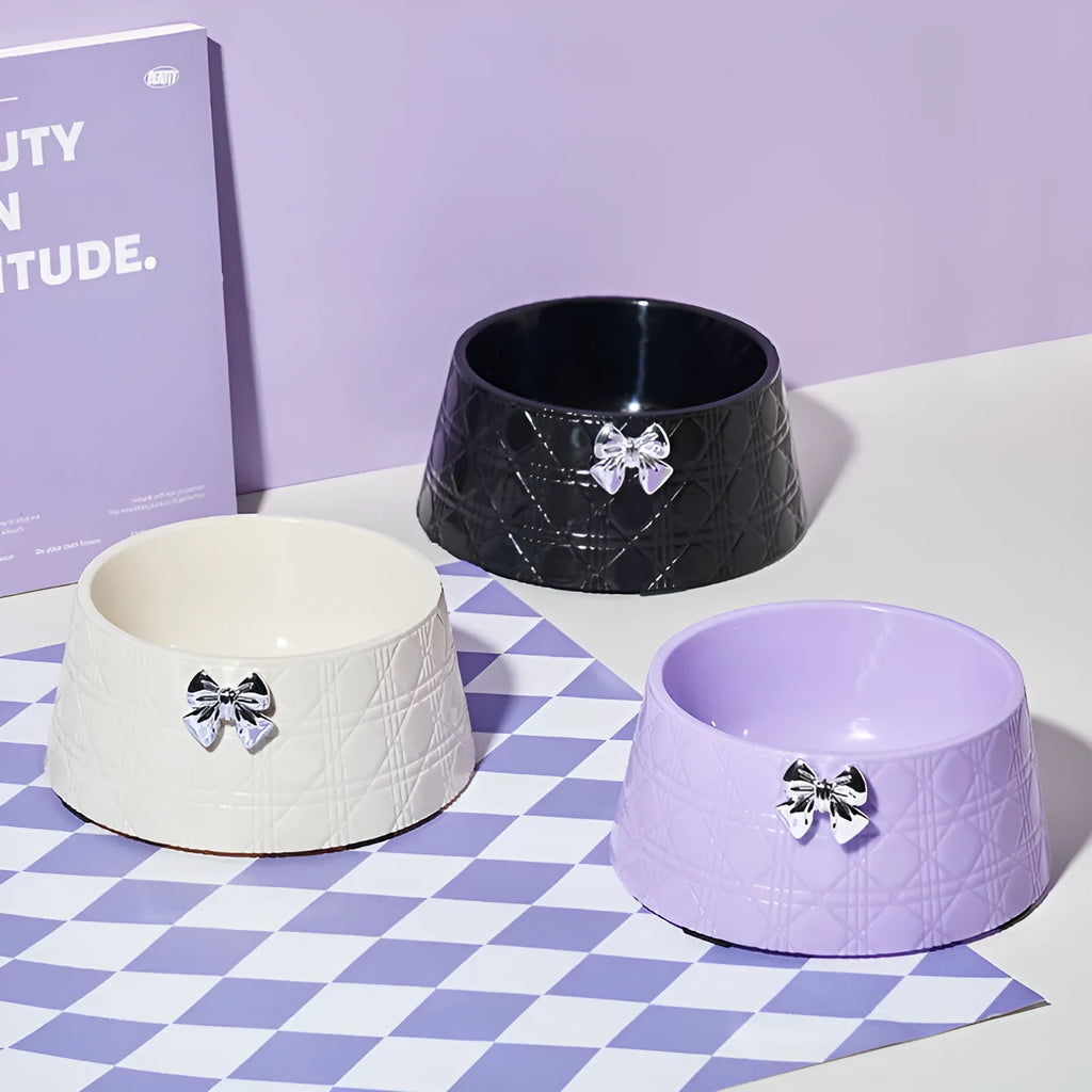 Diamond pattern pet feeding bowl with bowknot design in multiple colour options