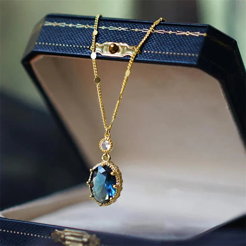 Gold colour retro geometric pendant on a copper fashion necklace chain.