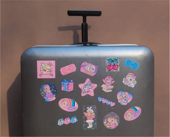 Korean cartoon sticker set showing square PVC designs with storage box