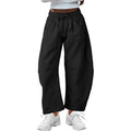 Women's loose cropped sweatpants in cotton fabric with elastic drawstring waistband in street fashion styling
