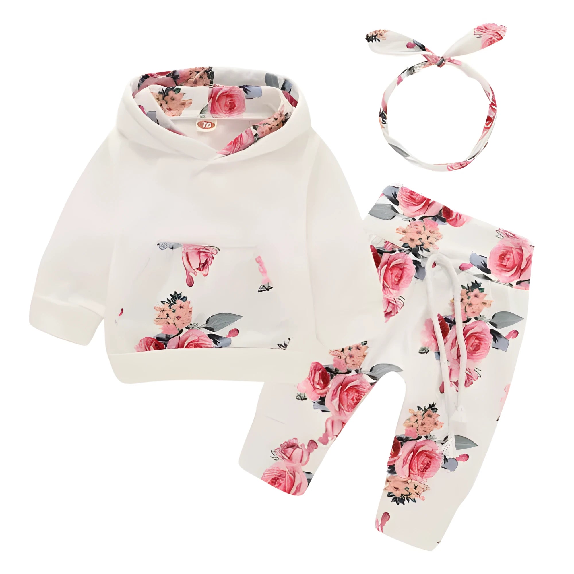 White cotton hooded pantsuit for a baby girl on a hanger, showing long sleeves and full-length trousers.