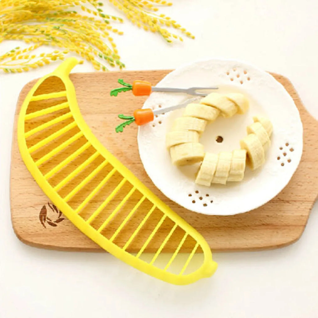 Yellow banana slicer made from food-grade PP plastic on a light background