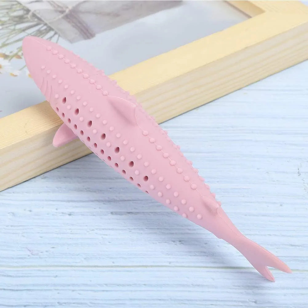 Green fish-shaped silicone chew toy for cats with breathable side holes for dental cleaning and pressure relief