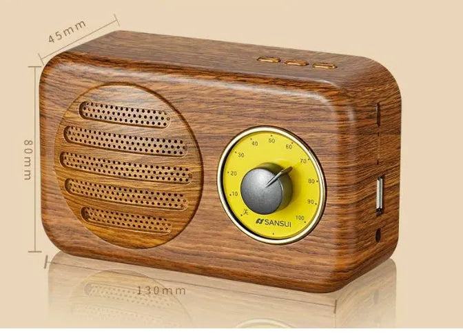 Compact portable Bluetooth speaker in wood colour finish with FM radio and USB cable.
