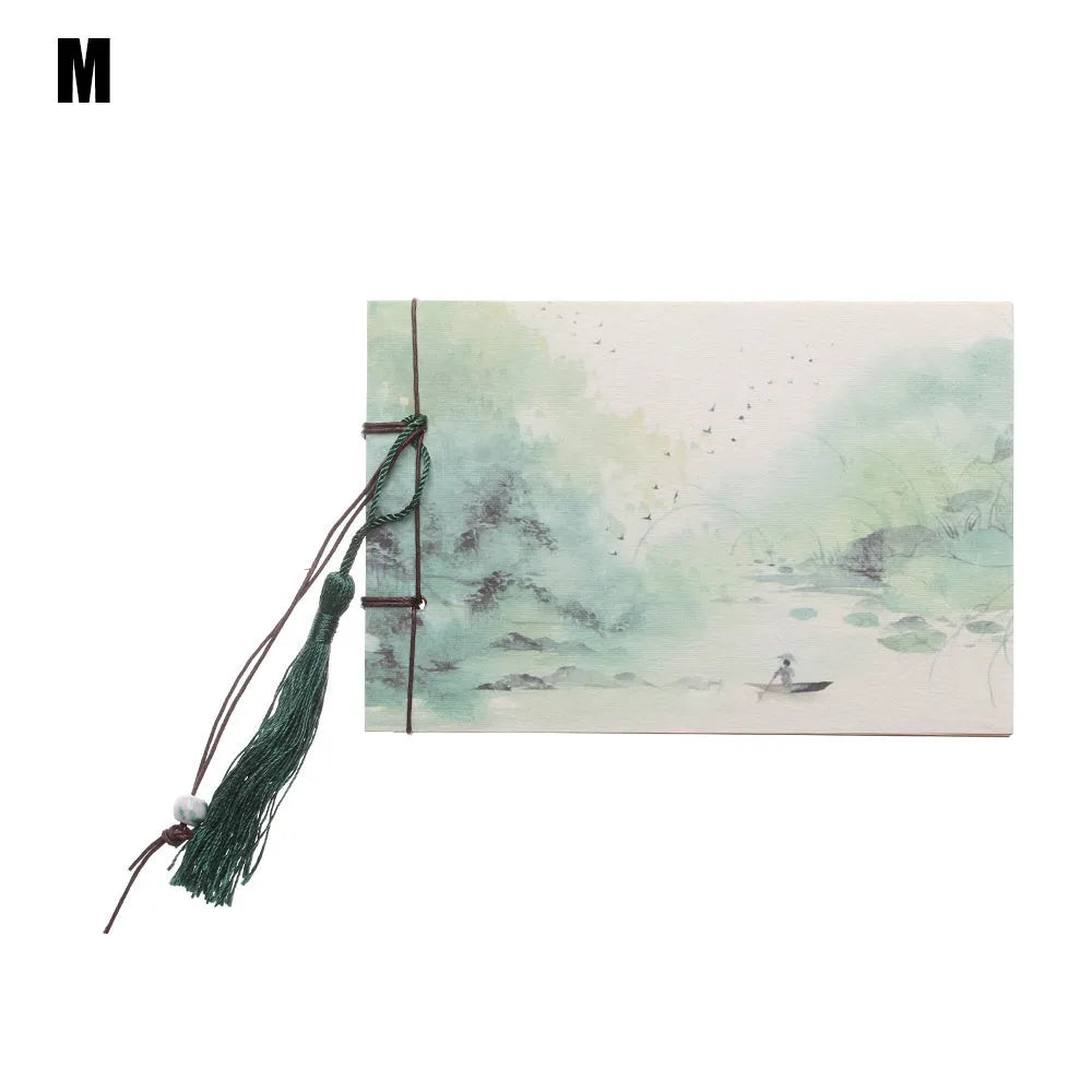 A5 kraft paper notebook with a hand-stitched binding and a hanging tassel bookmark in a natural design.