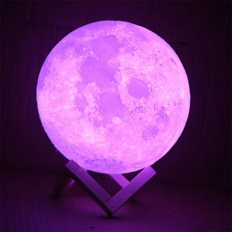 3D printed moon lamp on wooden stand showing lunar surface details with touch control ring