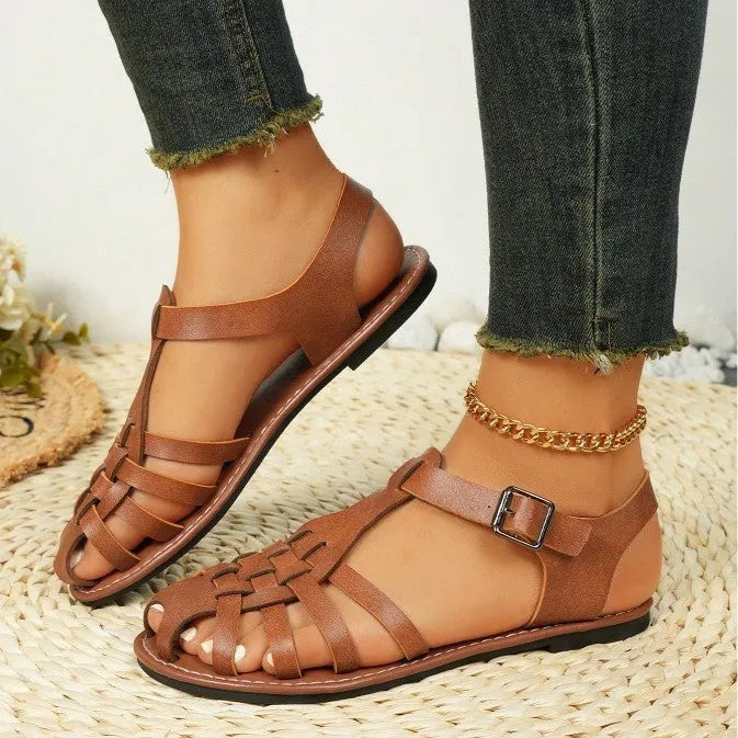 Dark brown women's vintage weave sandals with closed toe and buckle strap.