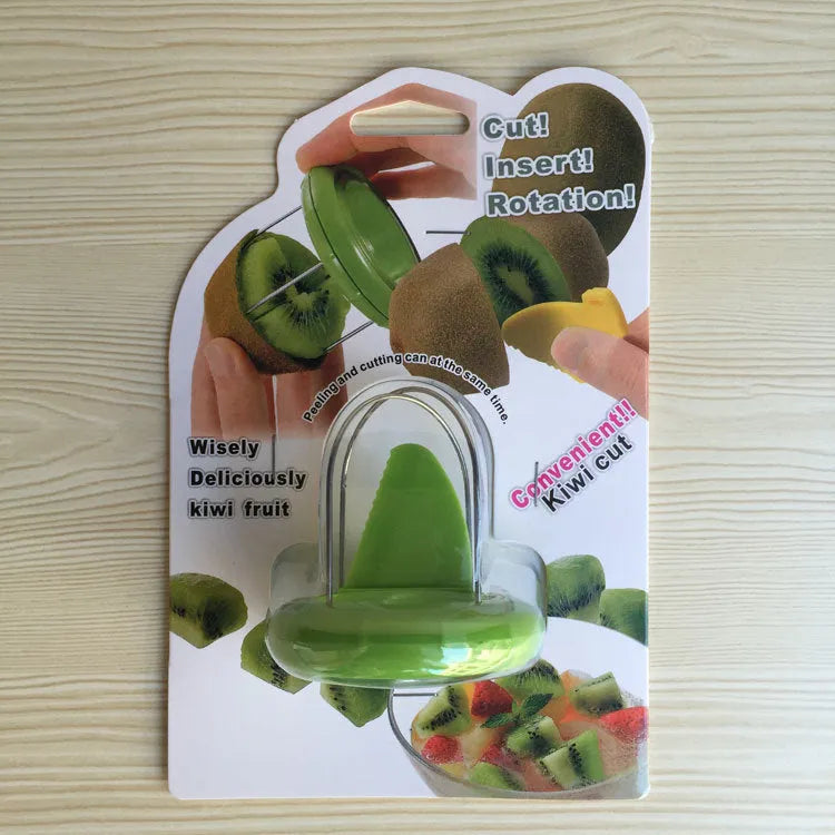 Mini kiwi fruit cutter peeler slicer on table showing compact size and stainless steel blade