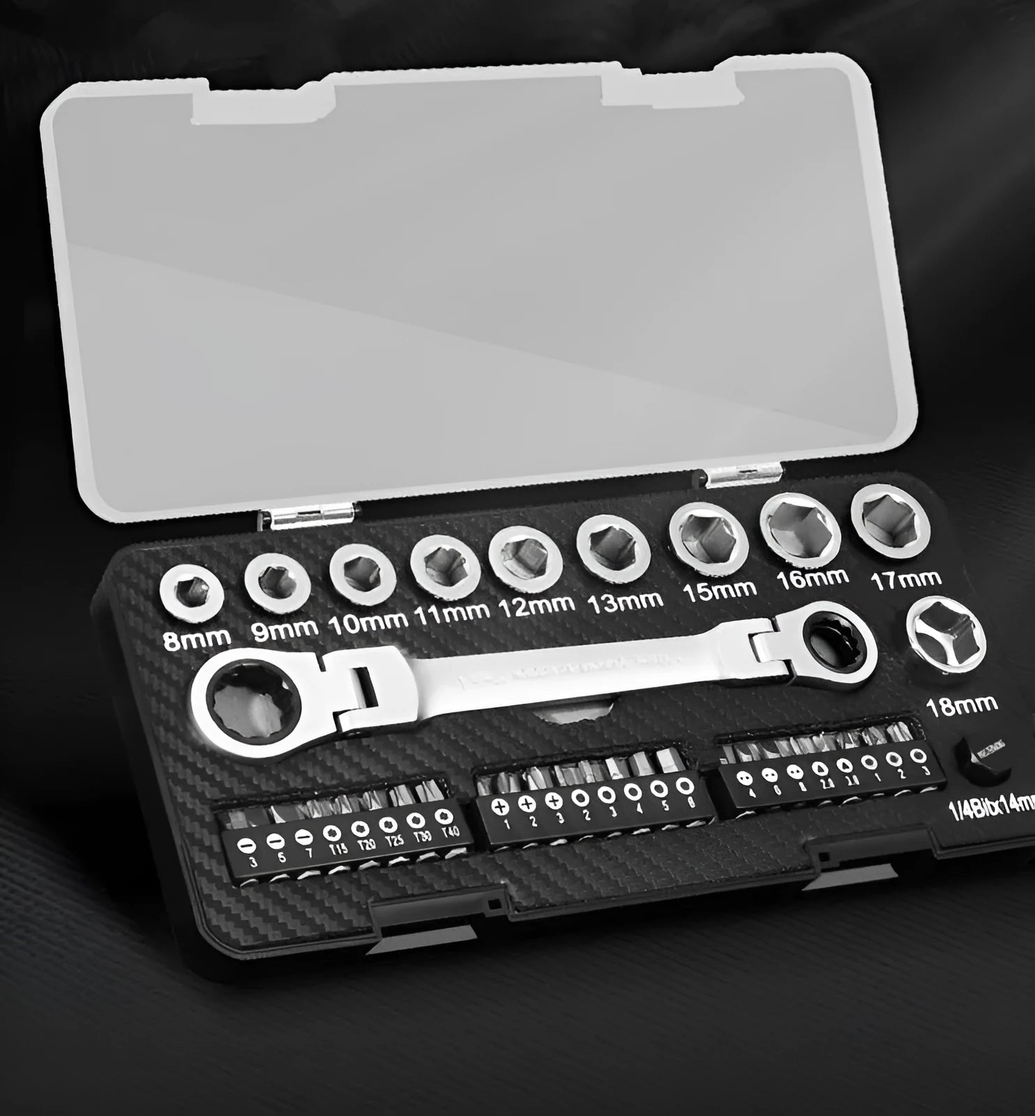 Dual-purpose ratchet wrench and screwdriver set with two-way mechanism, sockets, and bit heads on a workbench.