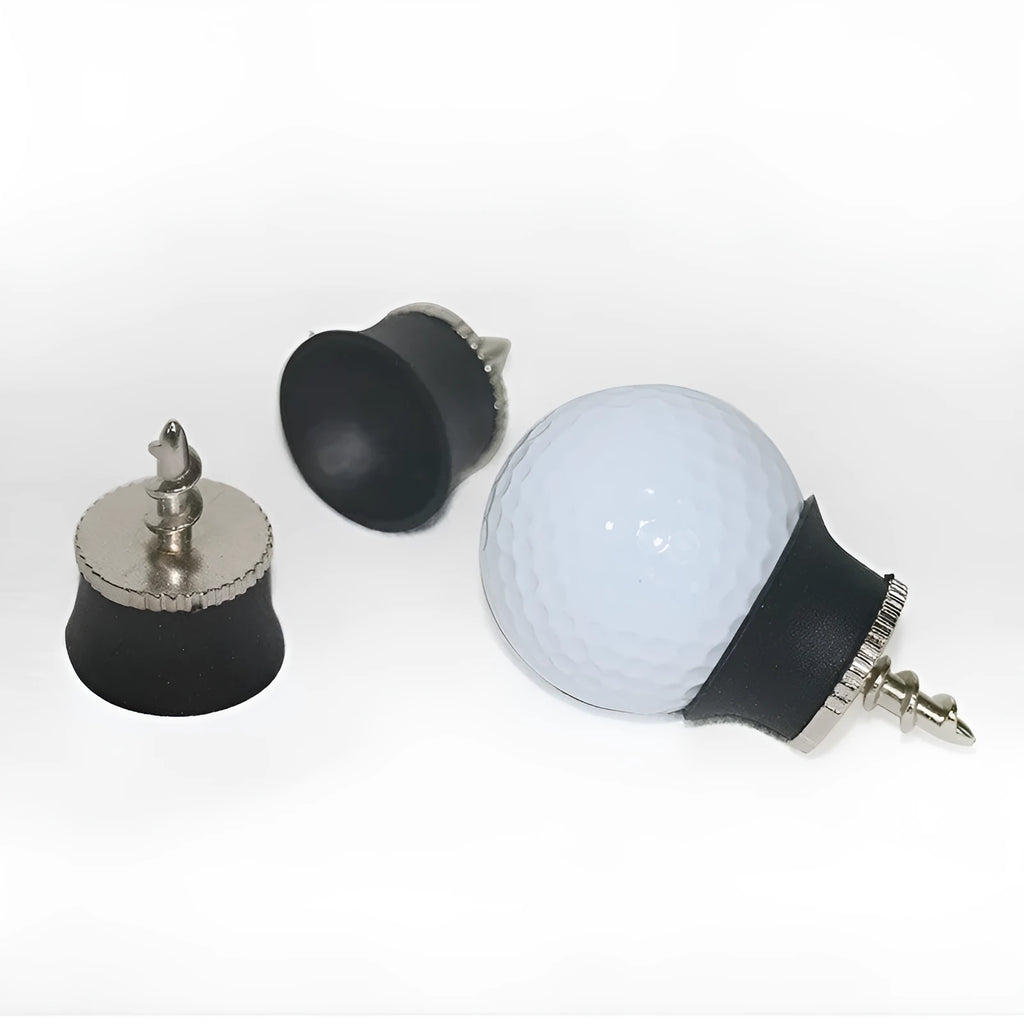 Black TPR golf ball suction cup picker with conventional size on a green surface
