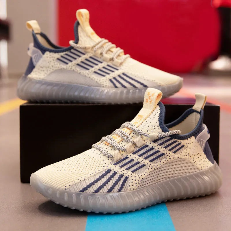 Men's breathable flying fabric sports shoes in white colour with mesh lining and round toe design