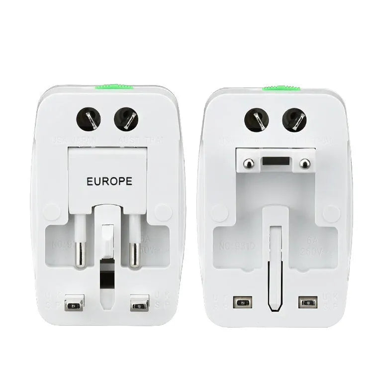 White universal travel plug adapter with dual USB ports and interchangeable UK EU US AU plugs on a plain background